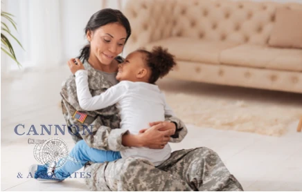 A military woman hugging her daughter.