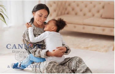 A military woman hugging her daughter.