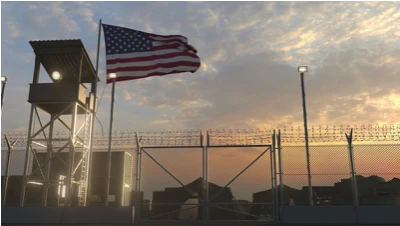 A flag waving above a military base.