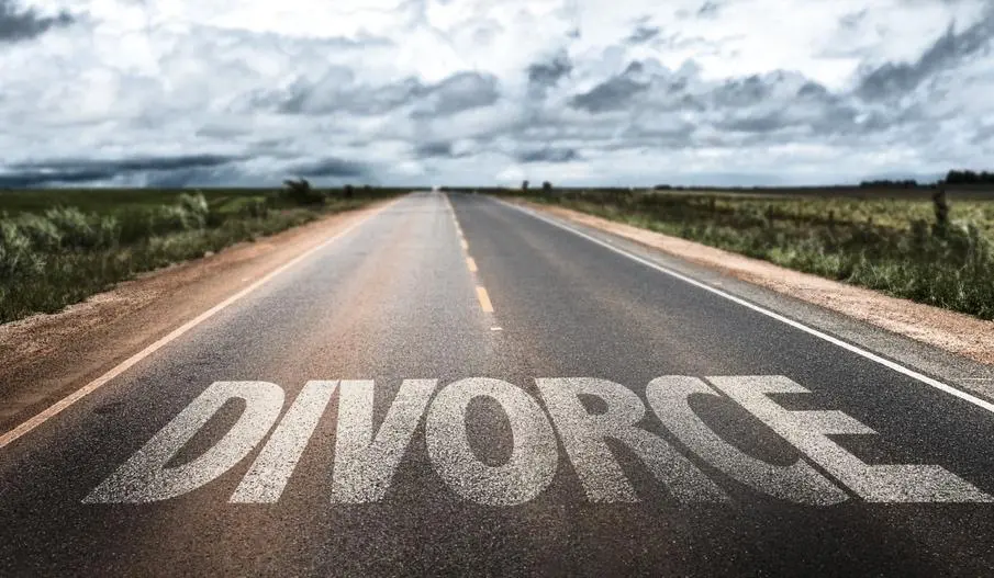 Divorce written on a highway road.