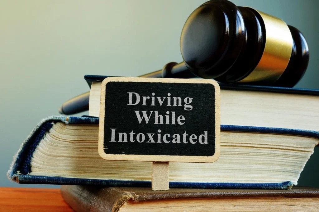 A sign near books saying driving while intoxicated.