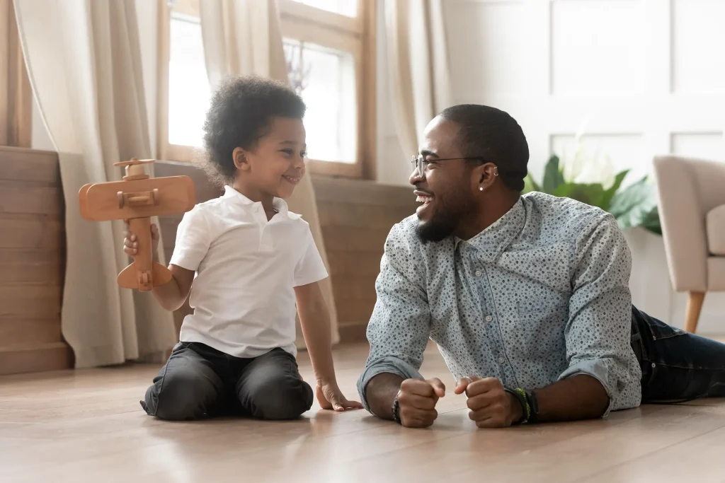 Father and son spending time together. Our Oklahoma City family law attorneys can help you reach a favorable outcome in your child custody case. 