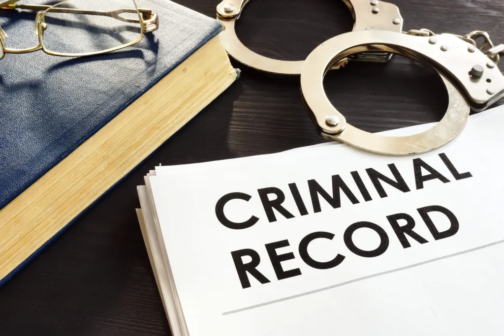 handcuffs and a criminal record file