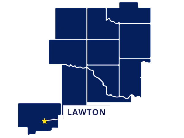 Map highlighting Lawton, Oklahoma with a yellow star and label, surrounded by outlined counties in dark blue.