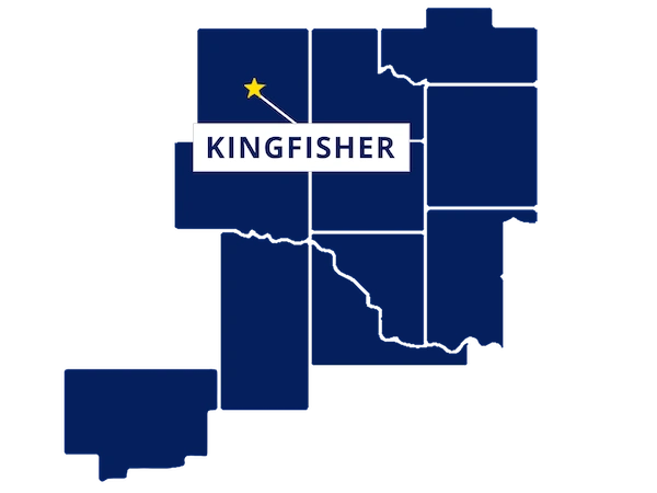 Map highlighting Kingfisher, Oklahoma with a yellow star and label, surrounded by outlined counties in dark blue.