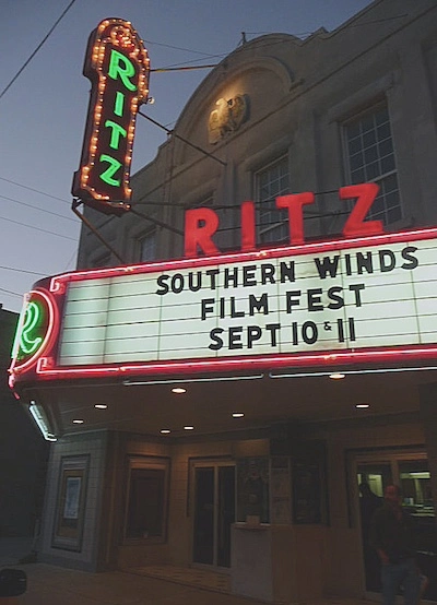 A theatre sign lit up at night of the Ritz theatre in Shawnee, Oklahoma